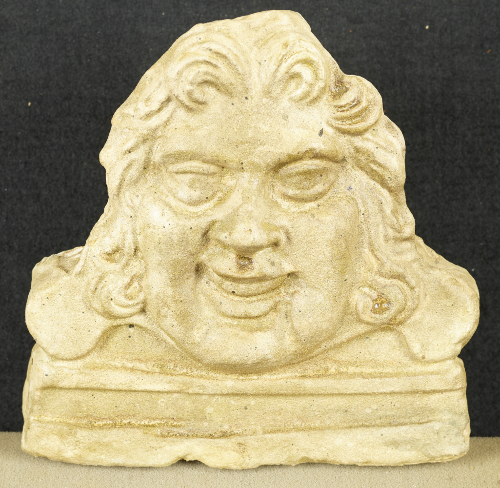 A plastic replica of a 2nd-century terracotta Gorgon's head from the Freud Museum, London.